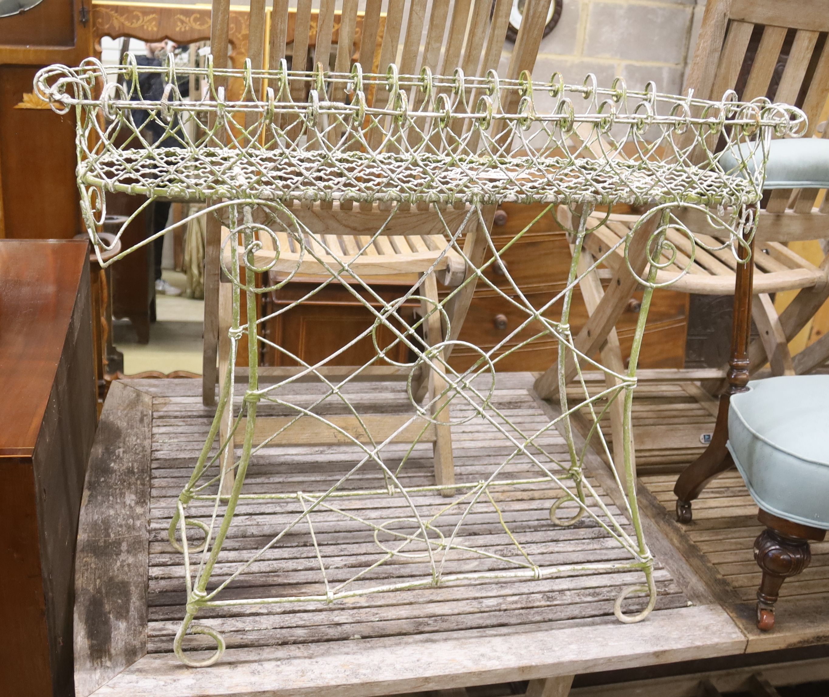 A Victorian wirework planter, width 100cm, depth 32cm, height 79cm